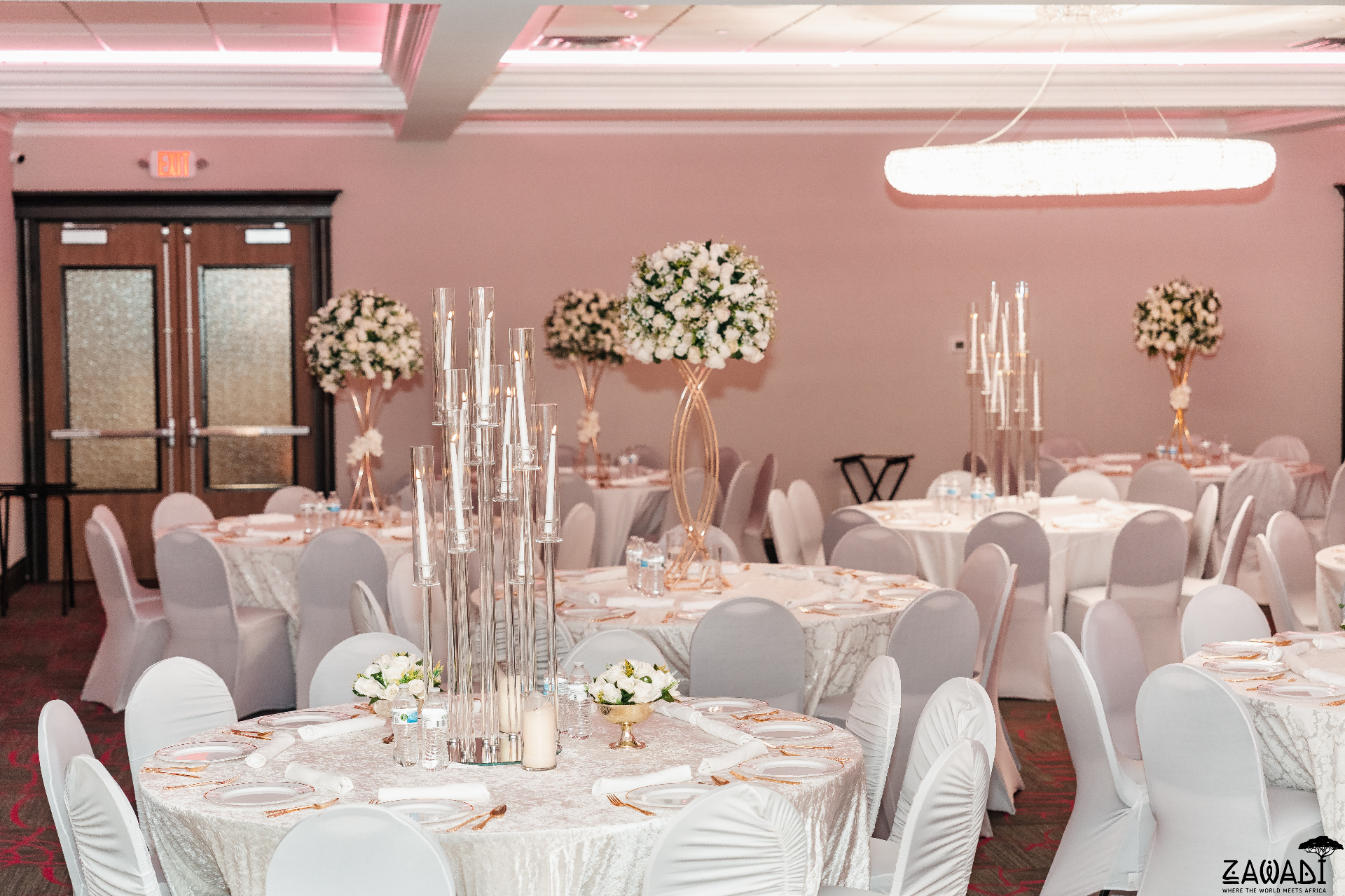 Refined table setting with roses and candlelight